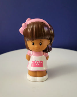 Fisher Price Little People Mia in a white and Pink Dress